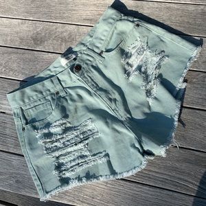 Green denim shorts
